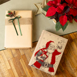 Regalo navideño premium colocable bajo el árbol con diseño de Papá Noel