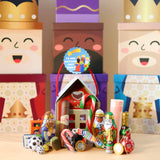 Casita Reyes Magos rellena de chocolates y dulces navideños.