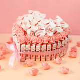 Tarta decorativa de bombones premium y rosas para regalar.
